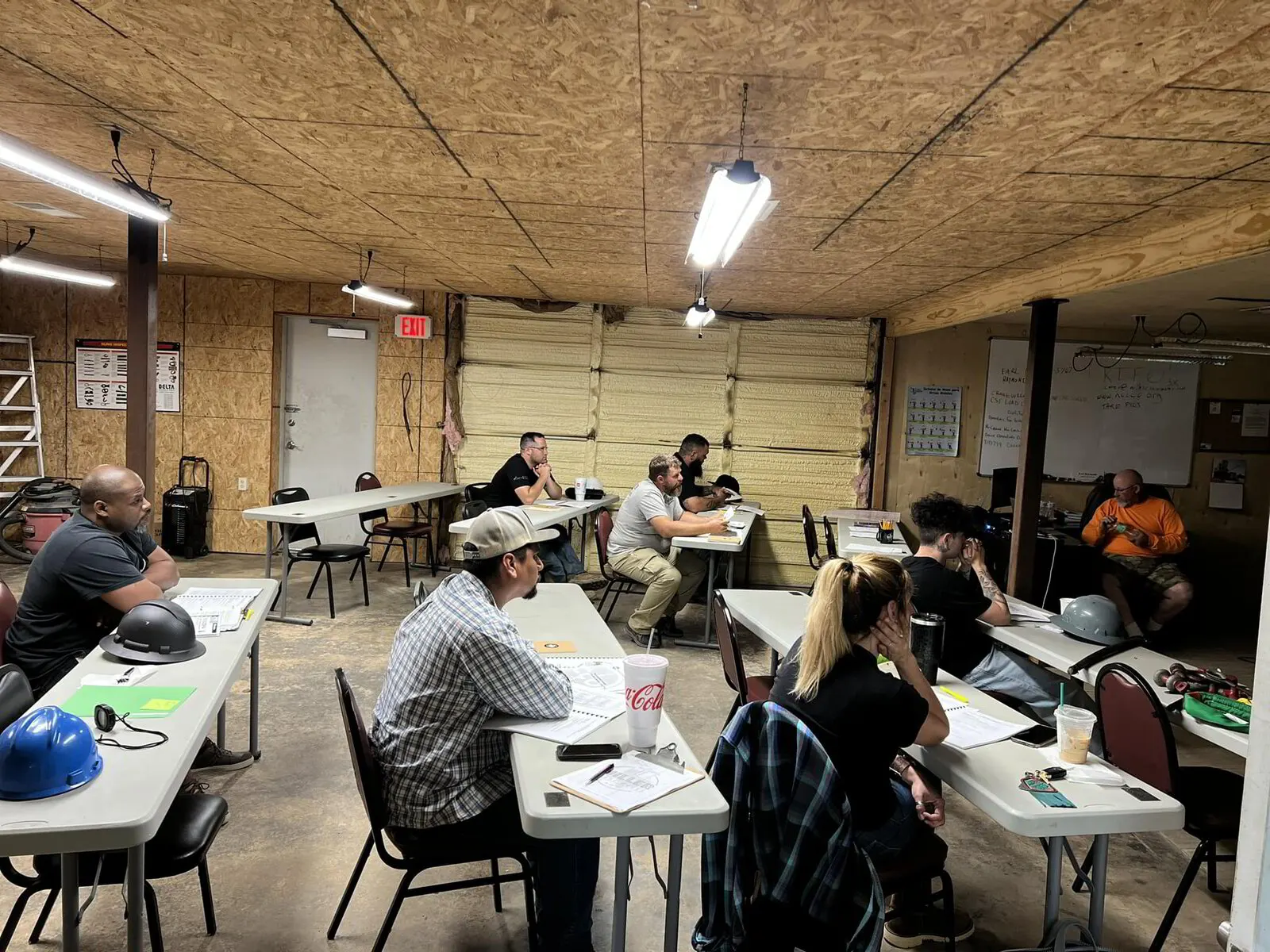 Crane operator students in a classroom session at Miller Crane Works
