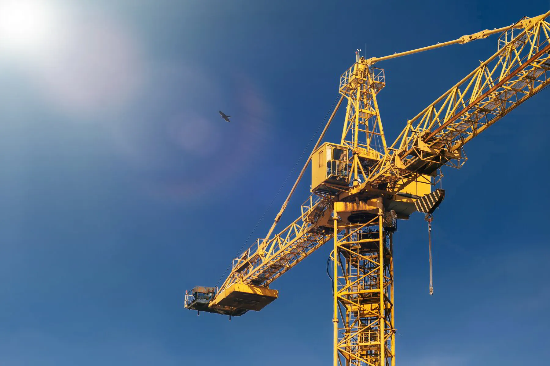 Tower crane in sunlight representing premium tower crane operator training